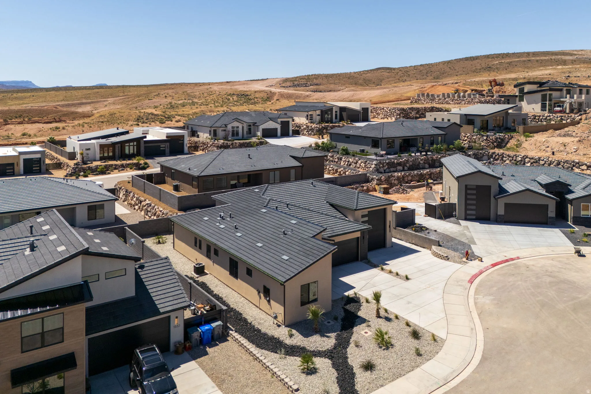 Aerial view of residential area with mountains