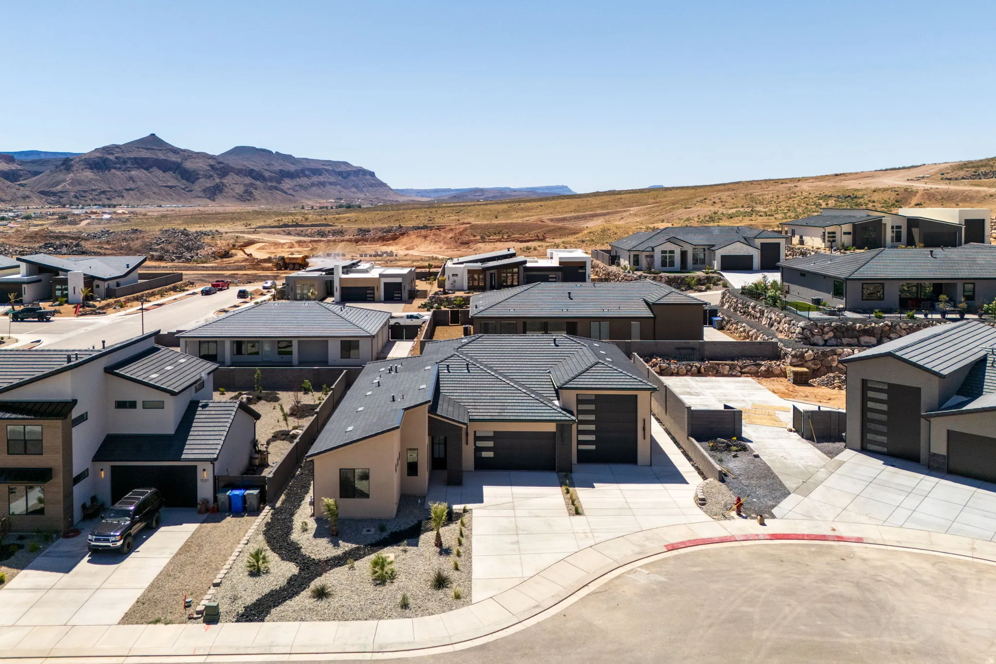 Aerial view of residential area with a mountain backdrop
