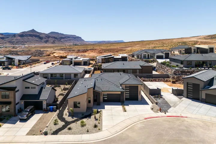 Aerial view of residential area with a mountain backdrop