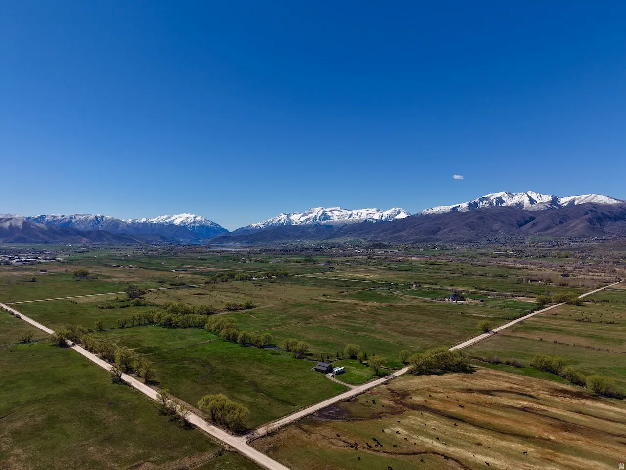 View of mountain backdrop featuring rural landscape
