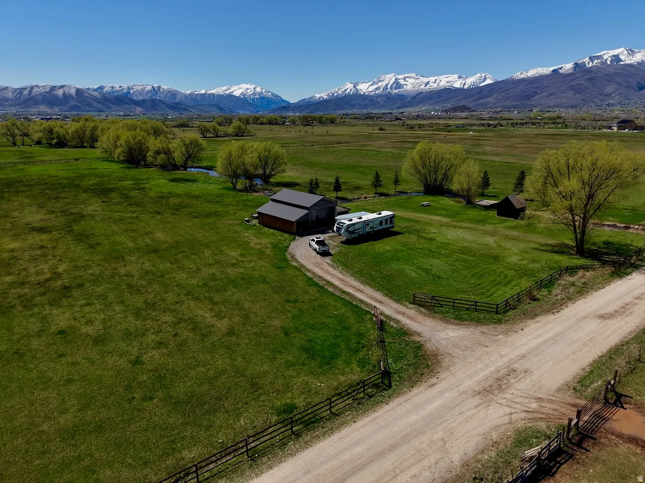 Overview of rural landscape featuring a pastoral area
