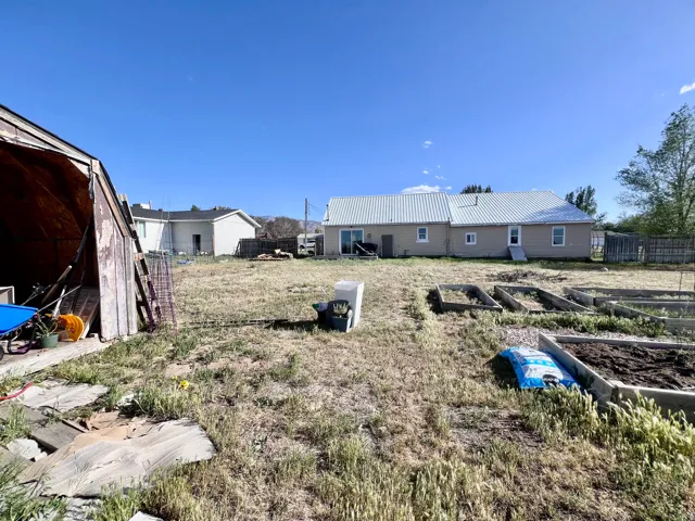 View of yard featuring a vegetable garden
