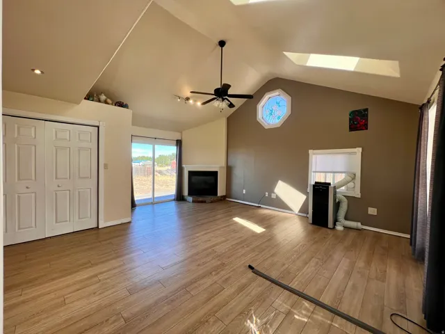 Vaulted ceiling with skylights and an octagonal window
