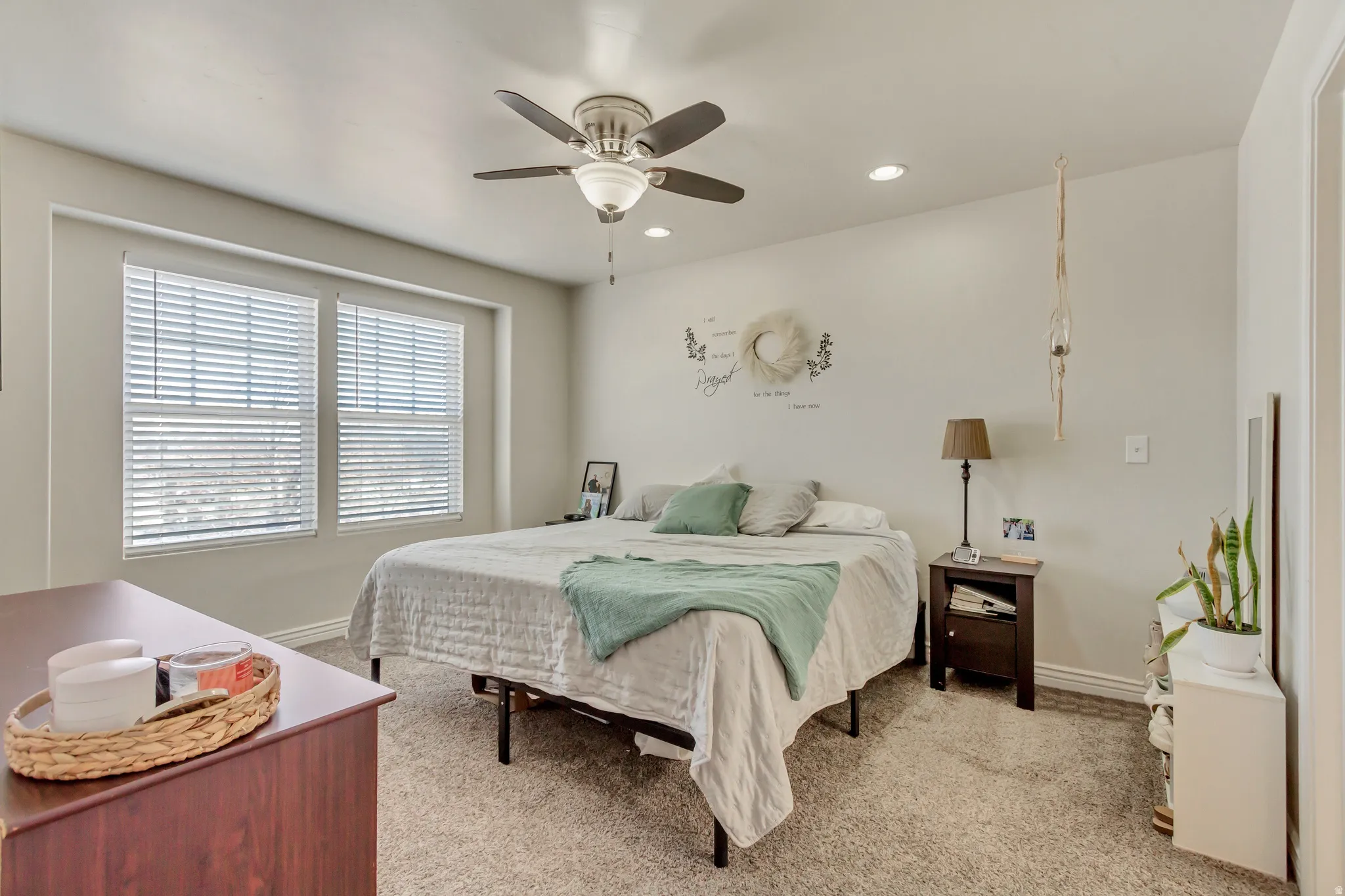 Bedroom with light carpet, recessed lighting, and ceiling fan