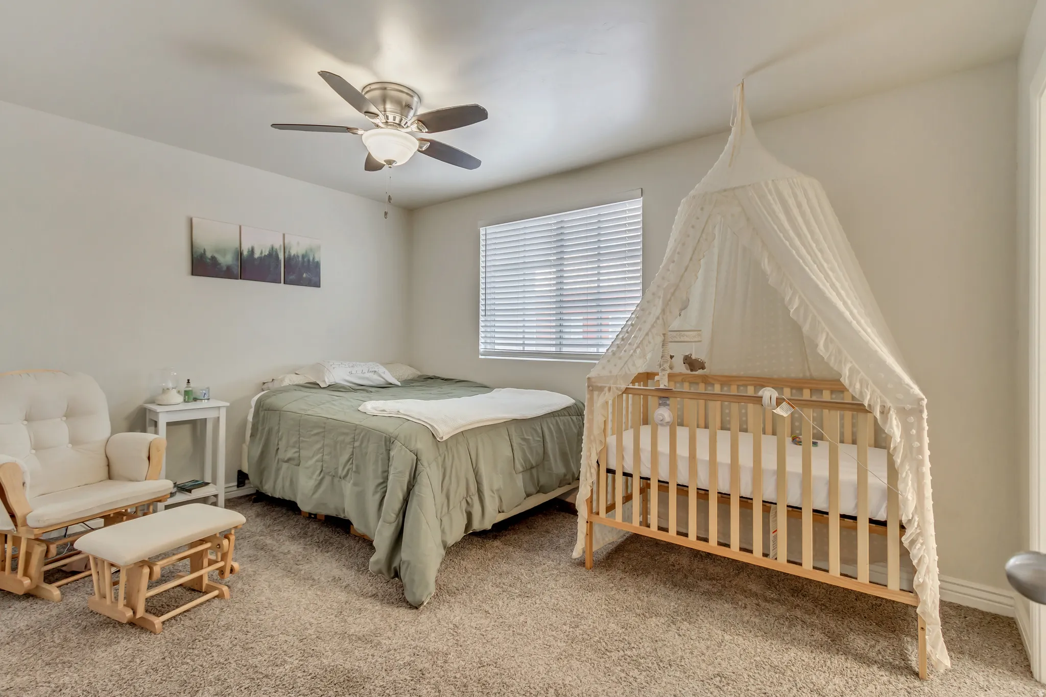 Bedroom with carpet flooring and ceiling fan