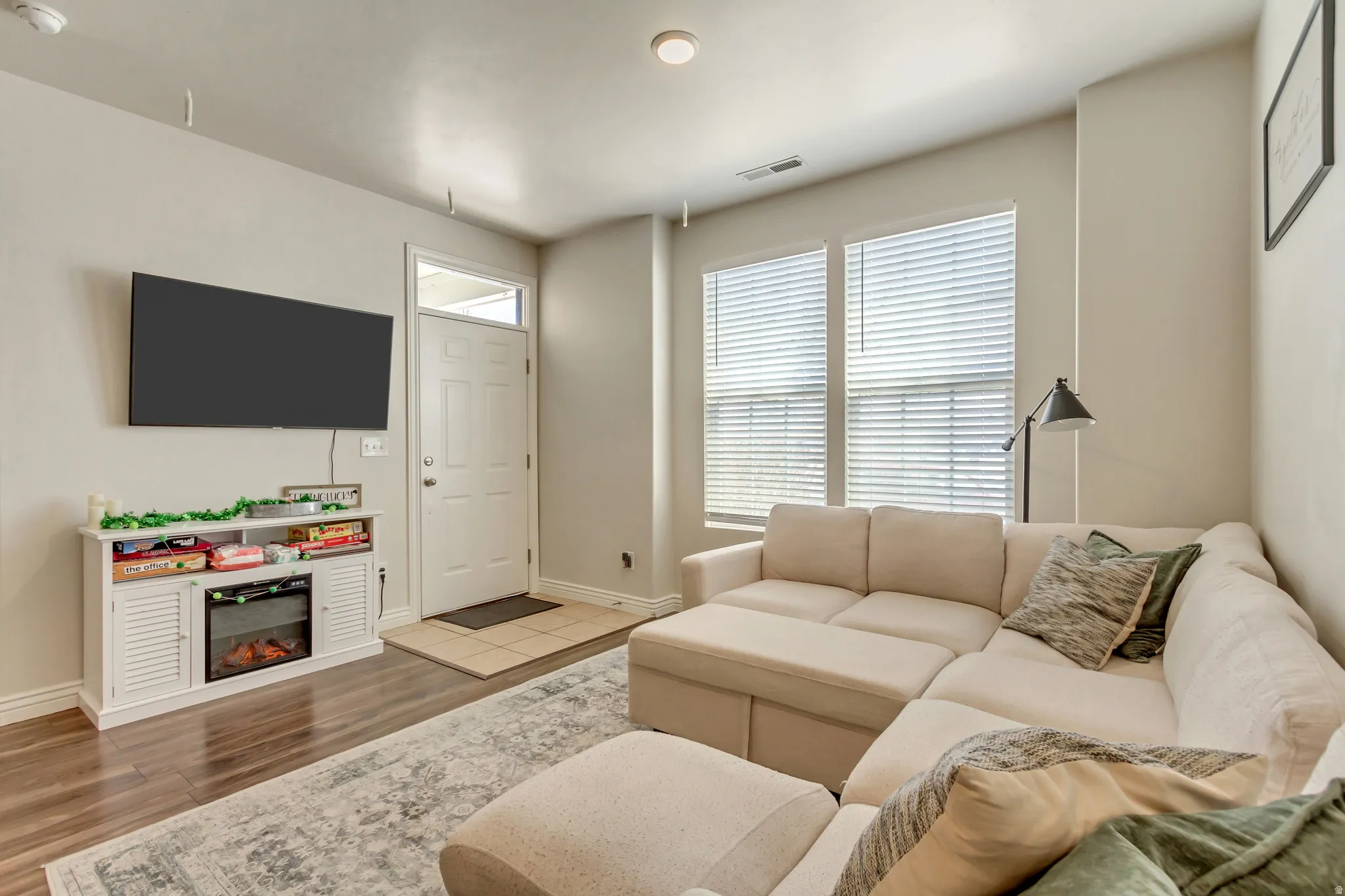 Living room with wood finished floors and baseboards