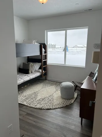 Bedroom featuring wood finished floors