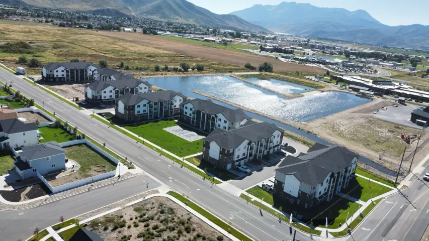 Aerial view of residential area featuring a mountain backdrop