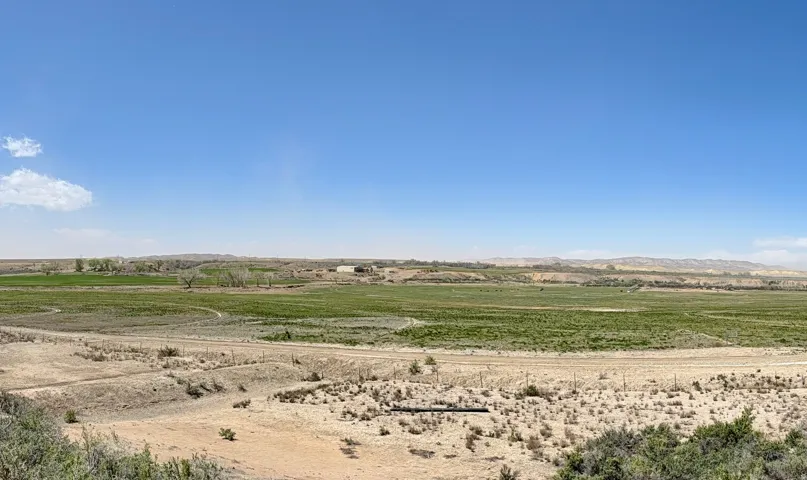View of undeveloped land featuring rural landscape and a mountainous background