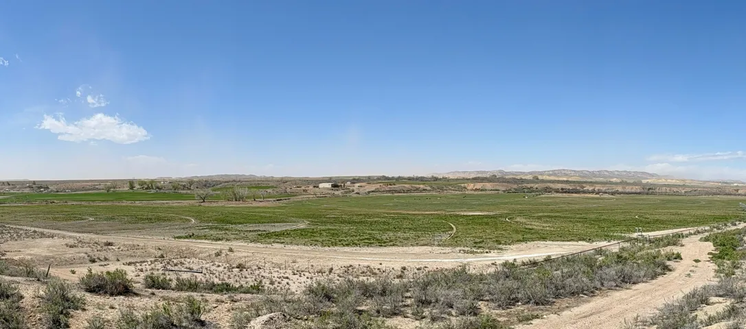 View of property's community with a view of rural / pastoral area and a mountain view