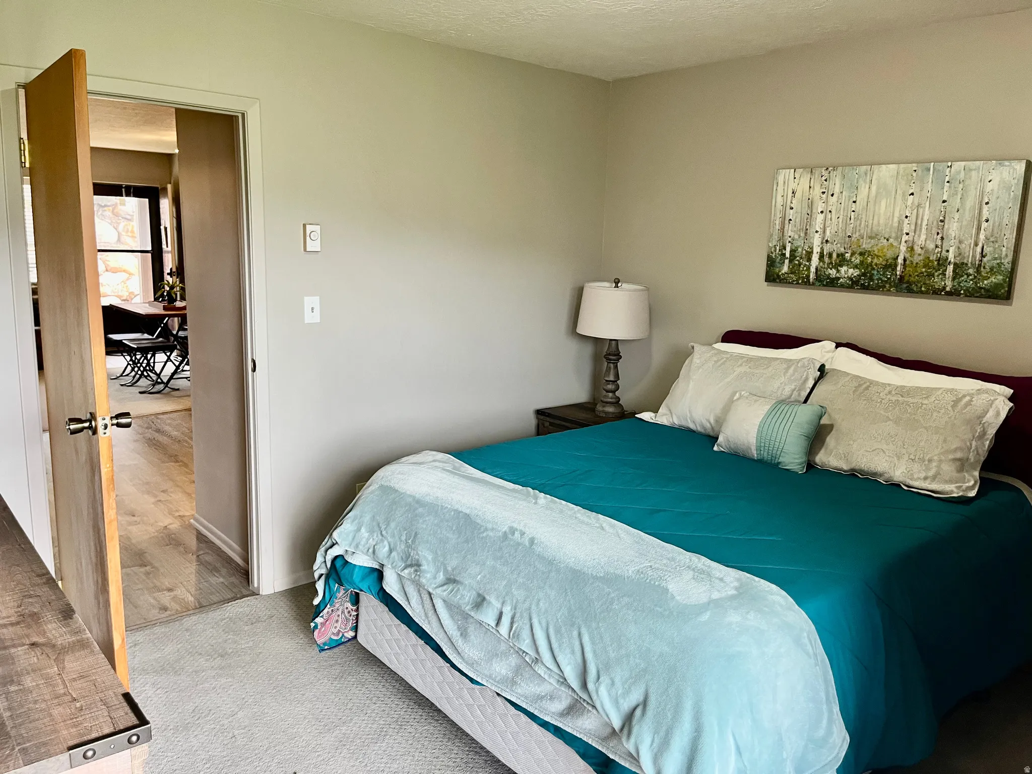 Main level Bedroom with Covered Deck