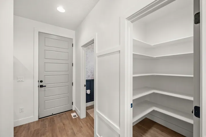 Entryway featuring light wood finished floors and baseboards
