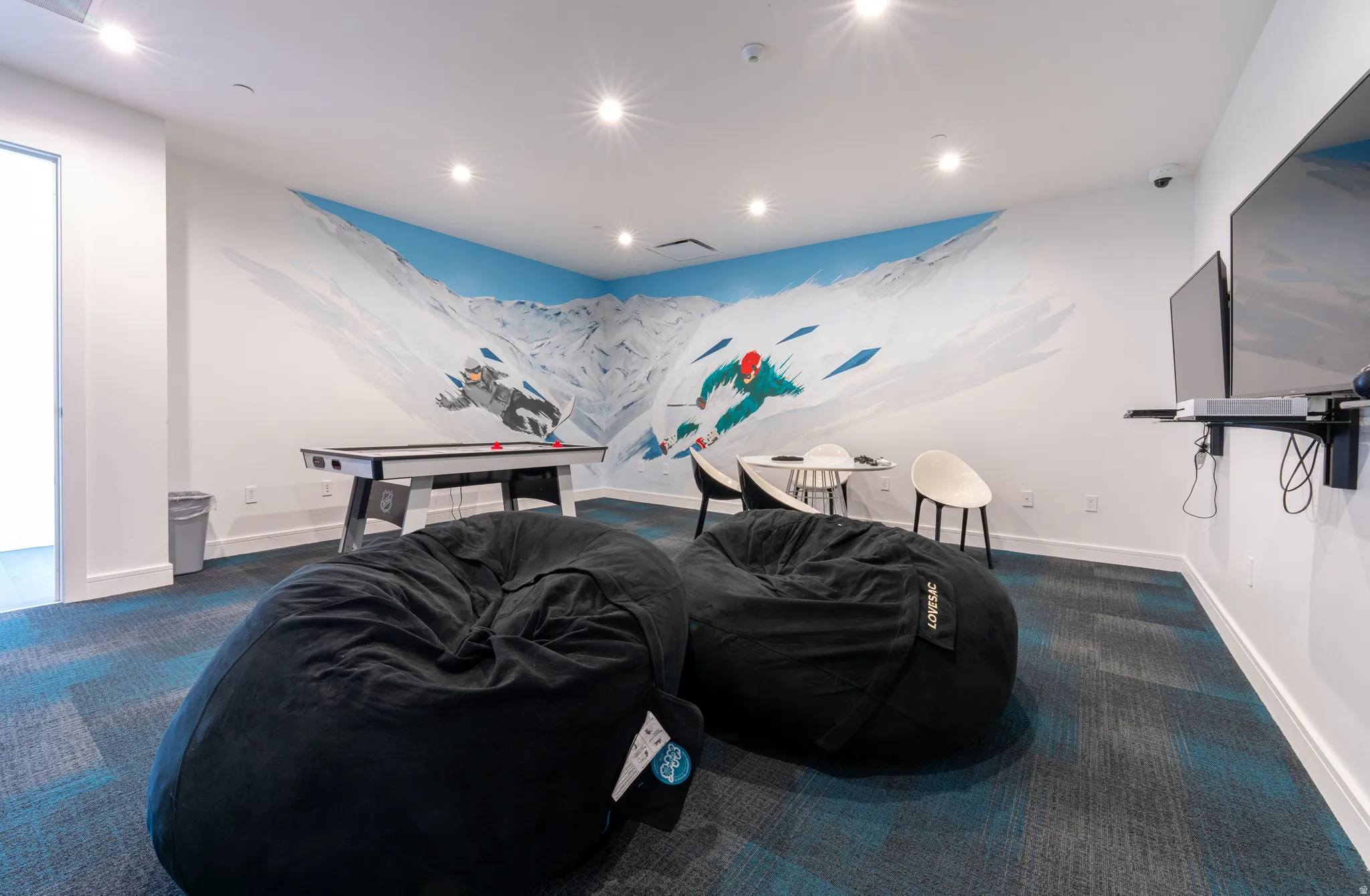 Playroom featuring recessed lighting and dark carpet