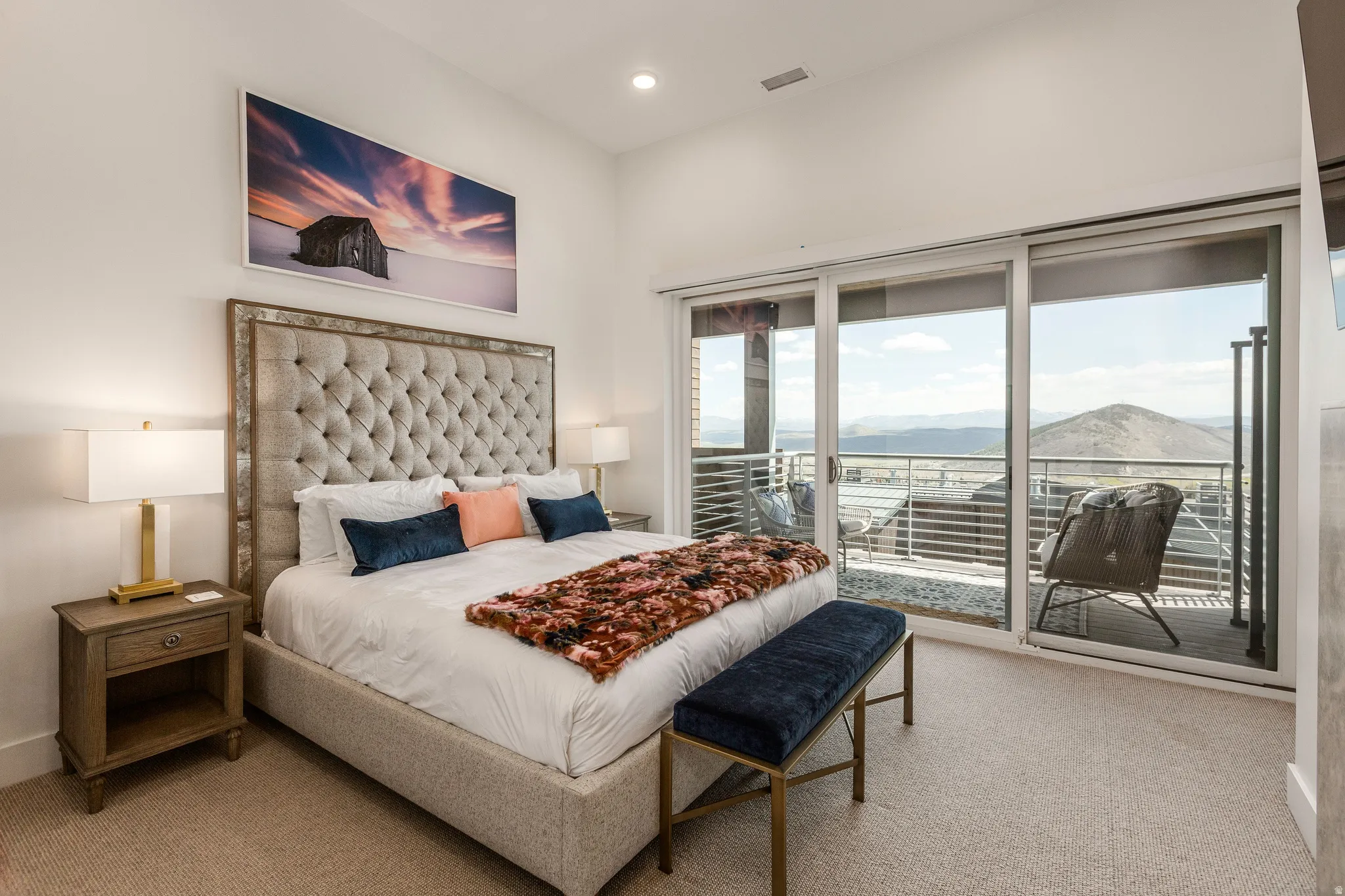 Bedroom featuring access to outside, light carpet, a mountain view, and recessed lighting