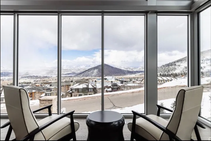 Living area with a mountain view and plenty of natural light
