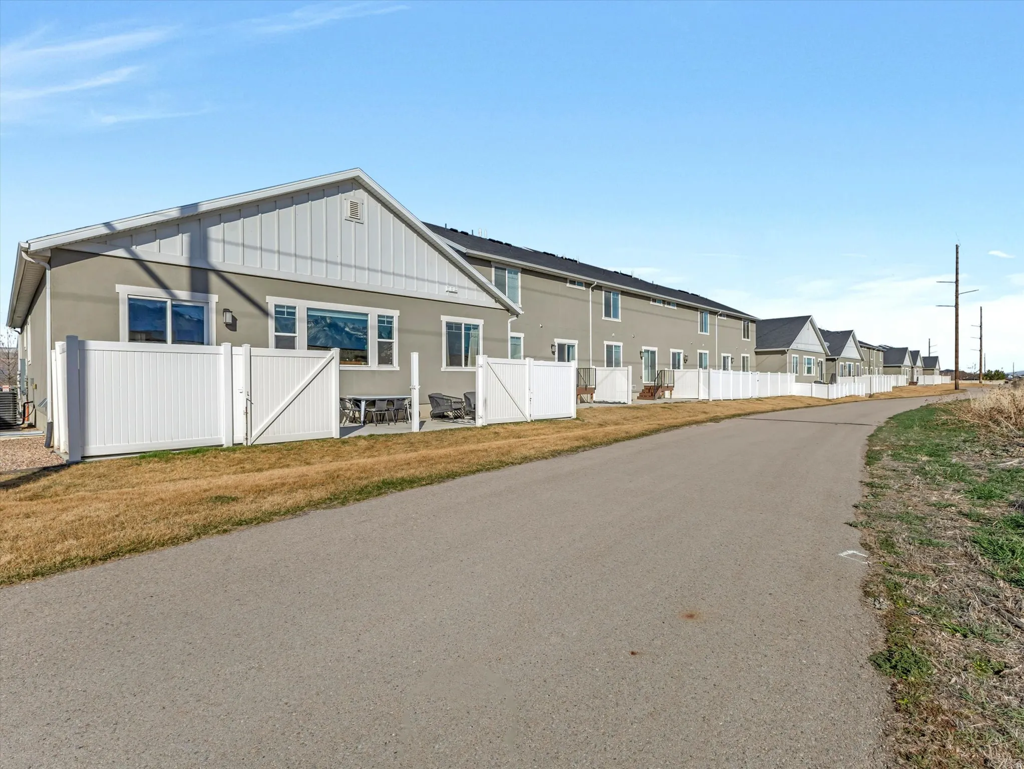 View of asphalt street with a residential view