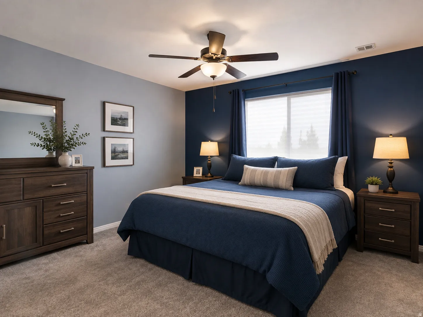 Wall-to-wall carpeting with a ceiling fan light fixture
