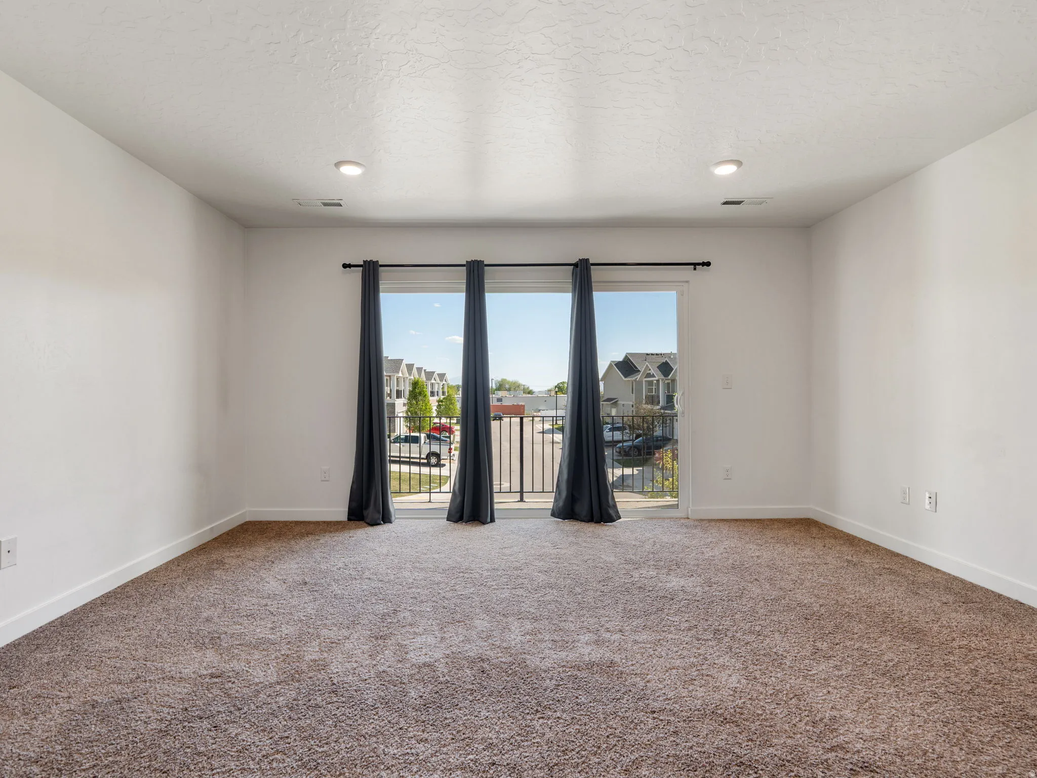 Primary Suite and view of Balcony