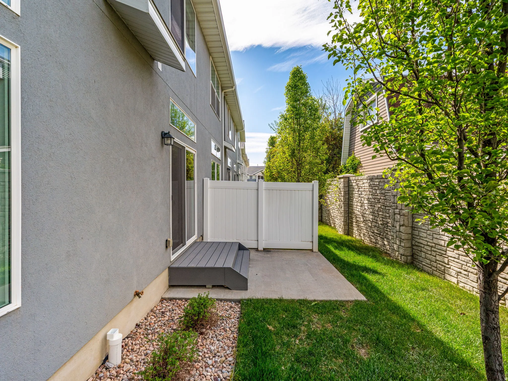 Partially Fenced yard featuring a patio area