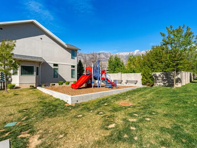 View of green lawn with a mountain view