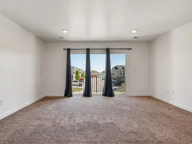 Primary Suite and view of Balcony