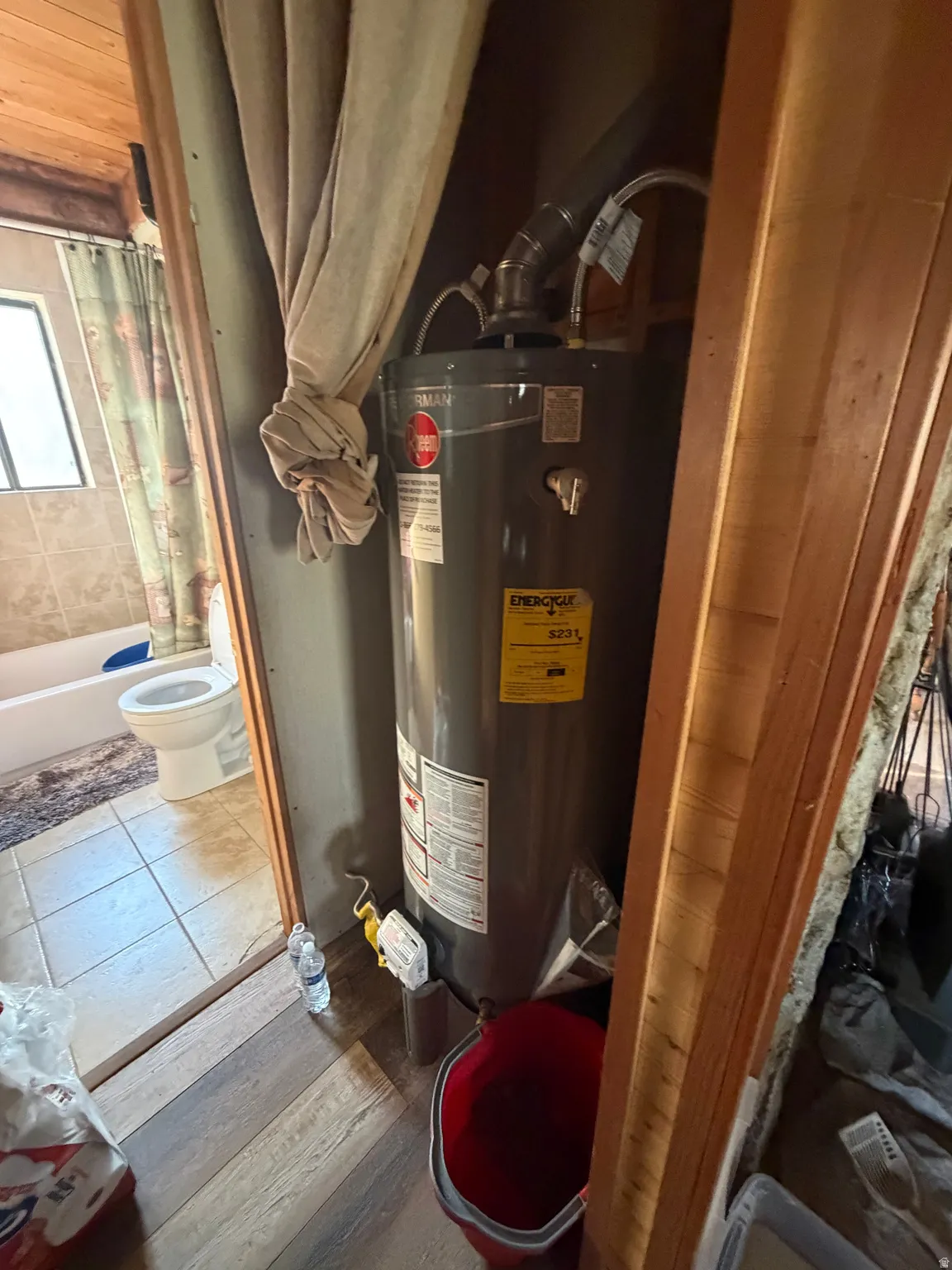 Utilities featuring gas water heater