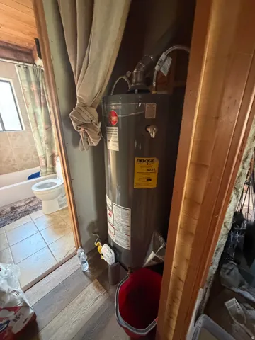 Utilities featuring gas water heater