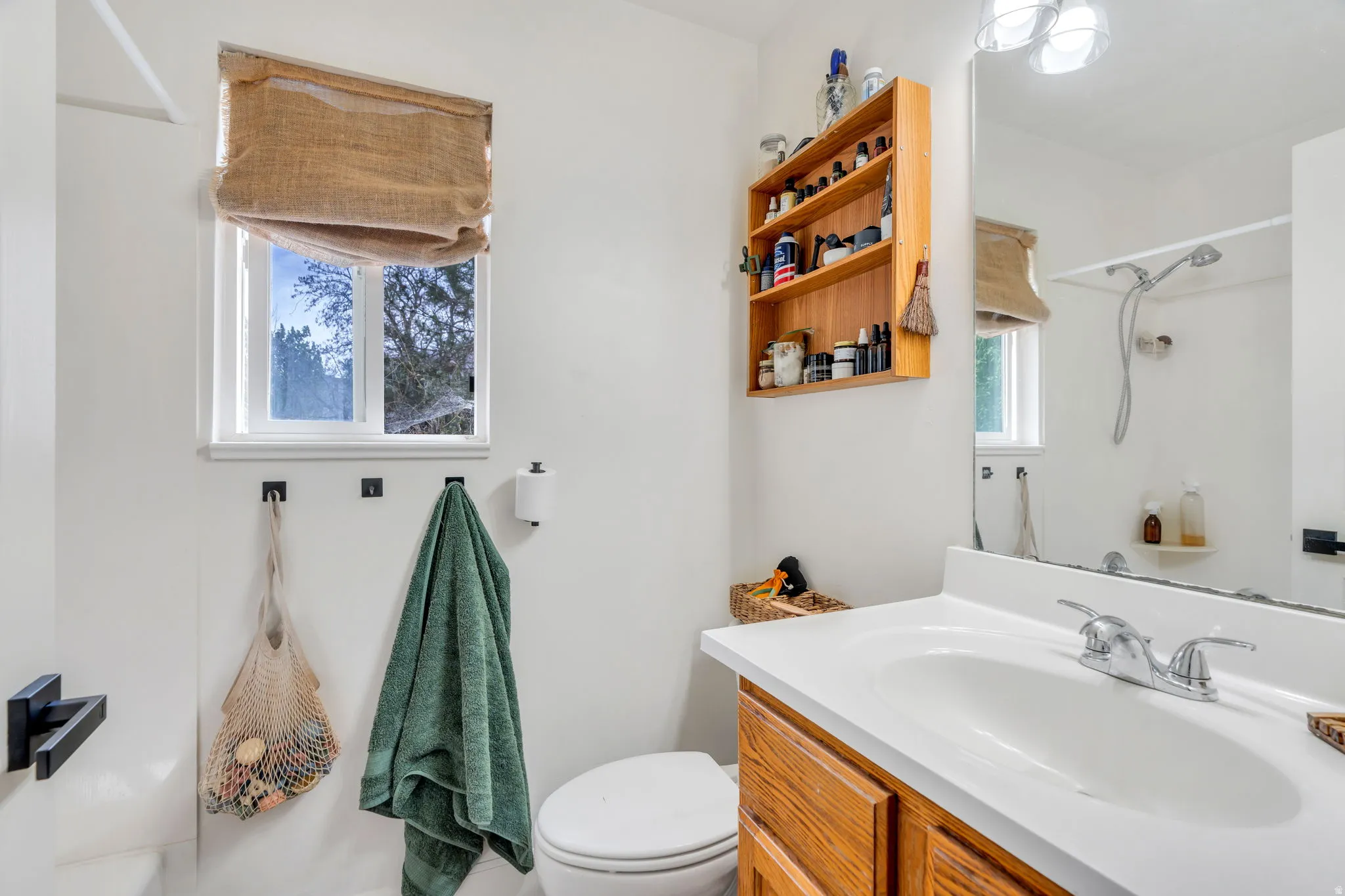 Primary bathroom with vanity and a shower