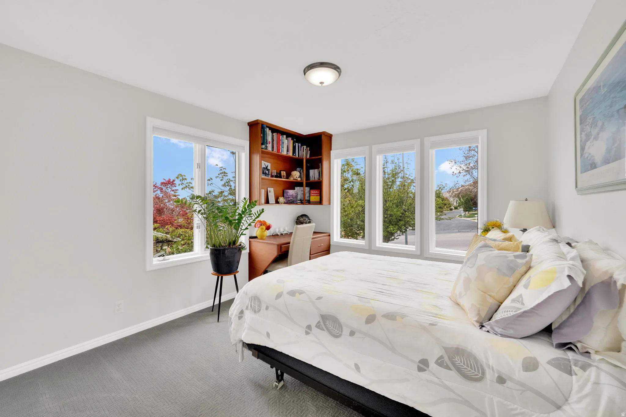 Carpeted bedroom with baseboards