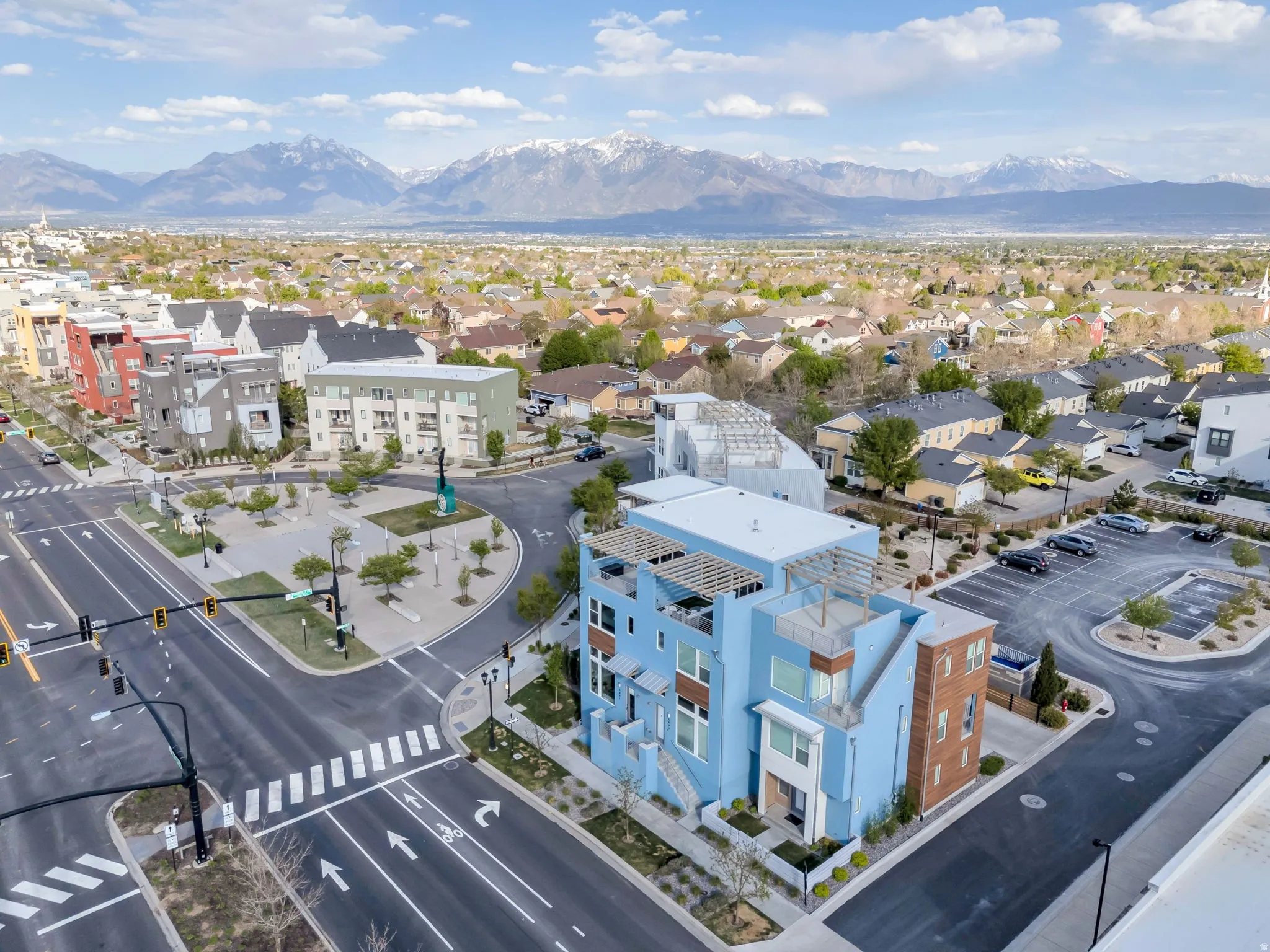 Aerial perspective of suburban area with mountains