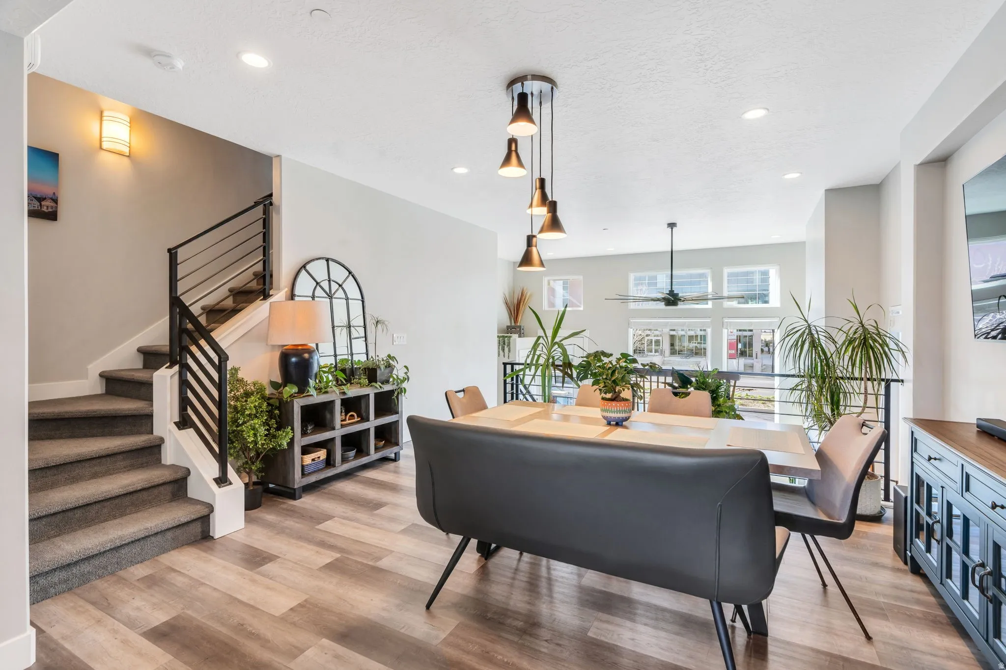 Dining space featuring light wood-style floors and recessed lighting