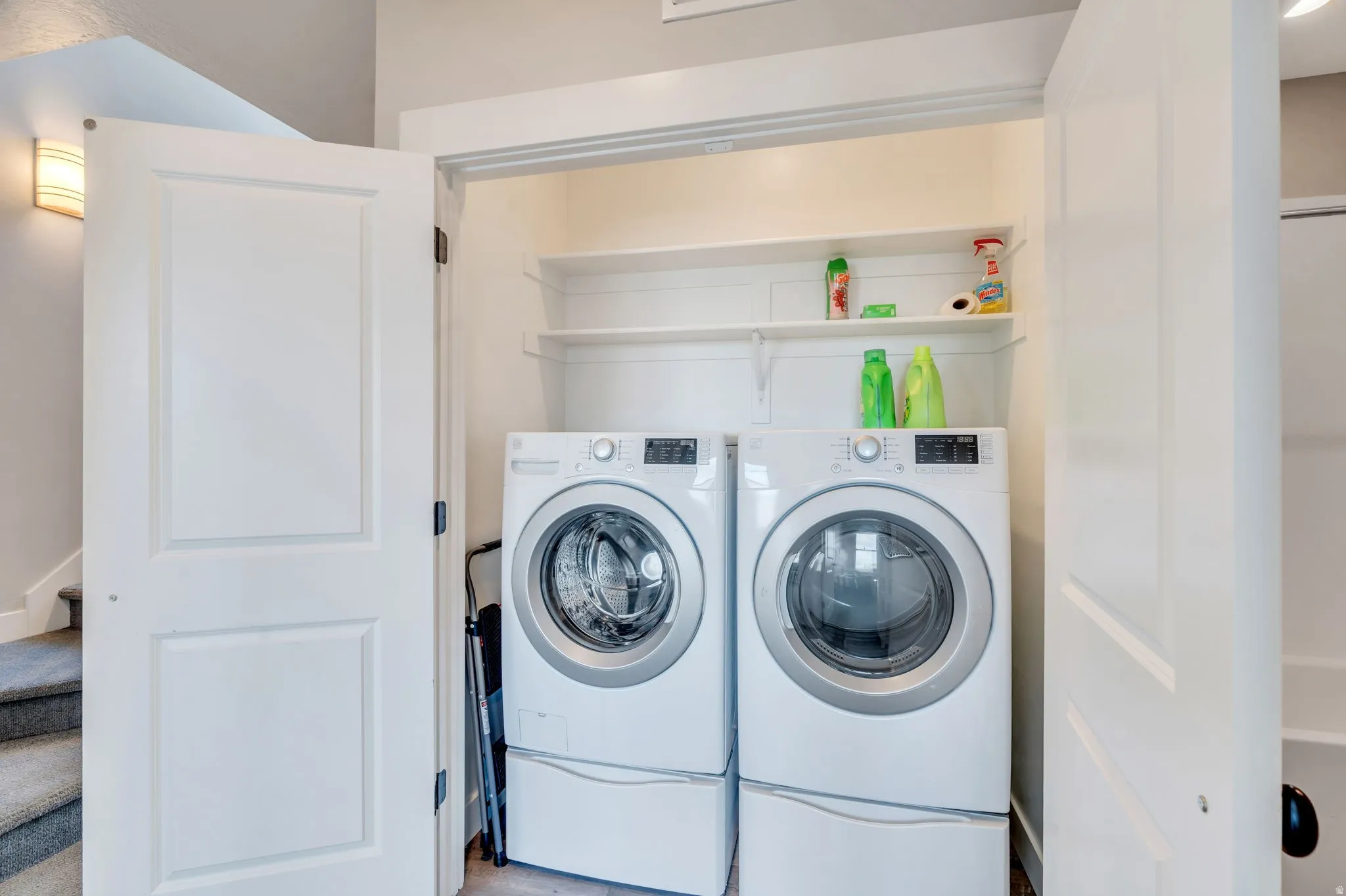 Laundry area featuring independent washer and dryer