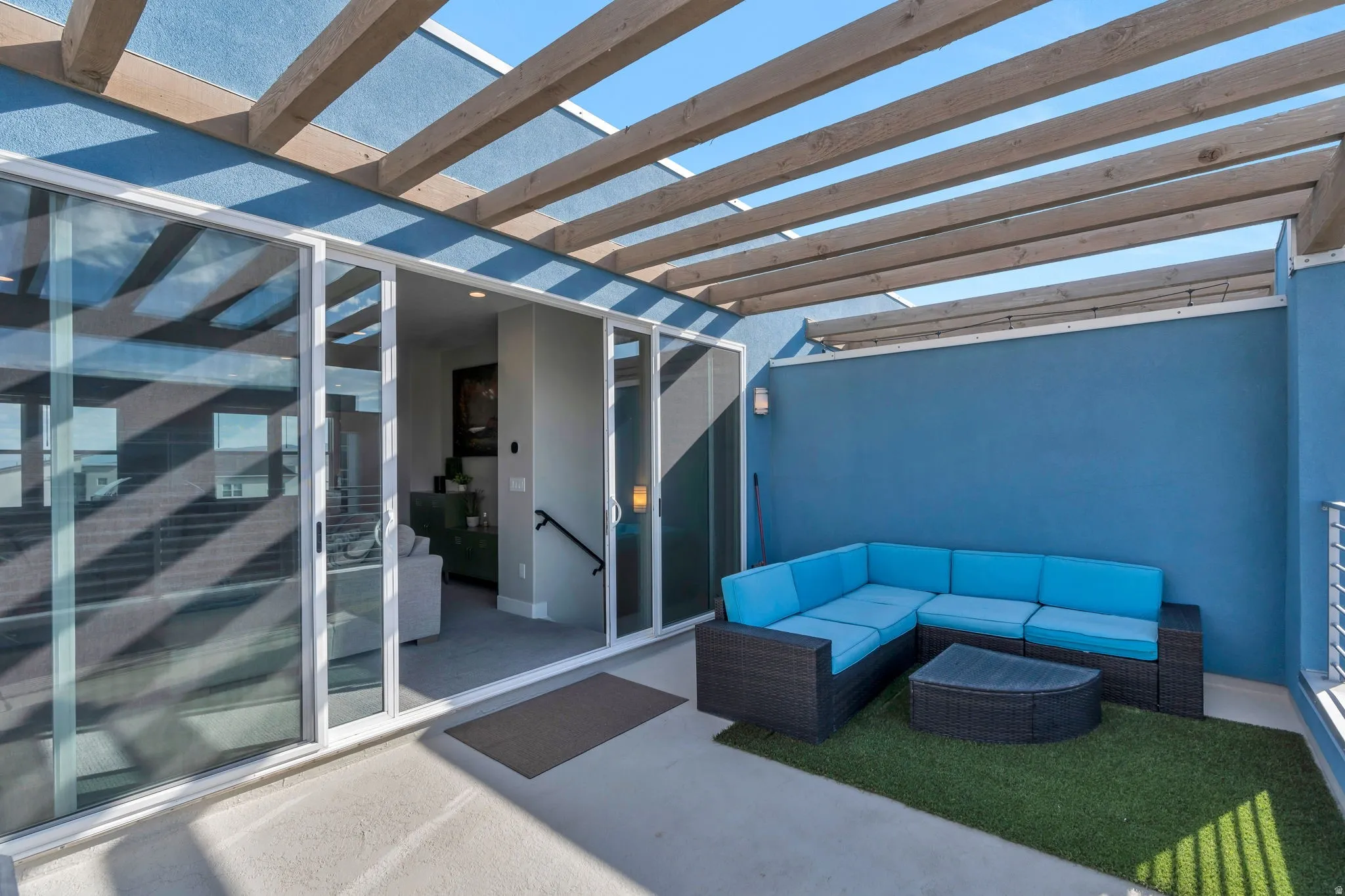View of patio / terrace featuring an outdoor hangout area and a pergola