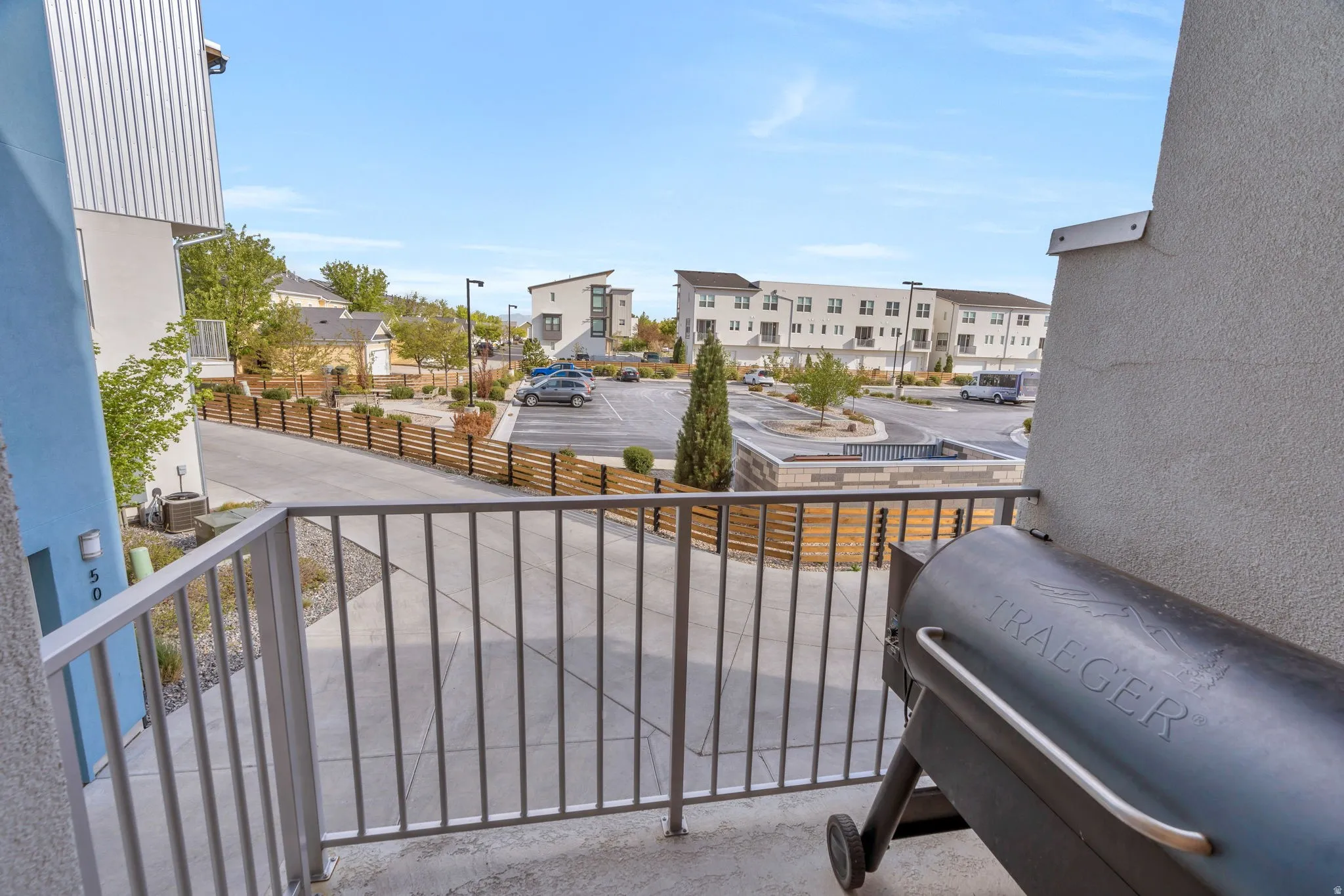 Balcony featuring area for grilling