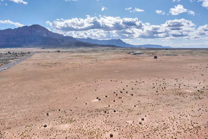 View of mountain backdrop with a desert landscape