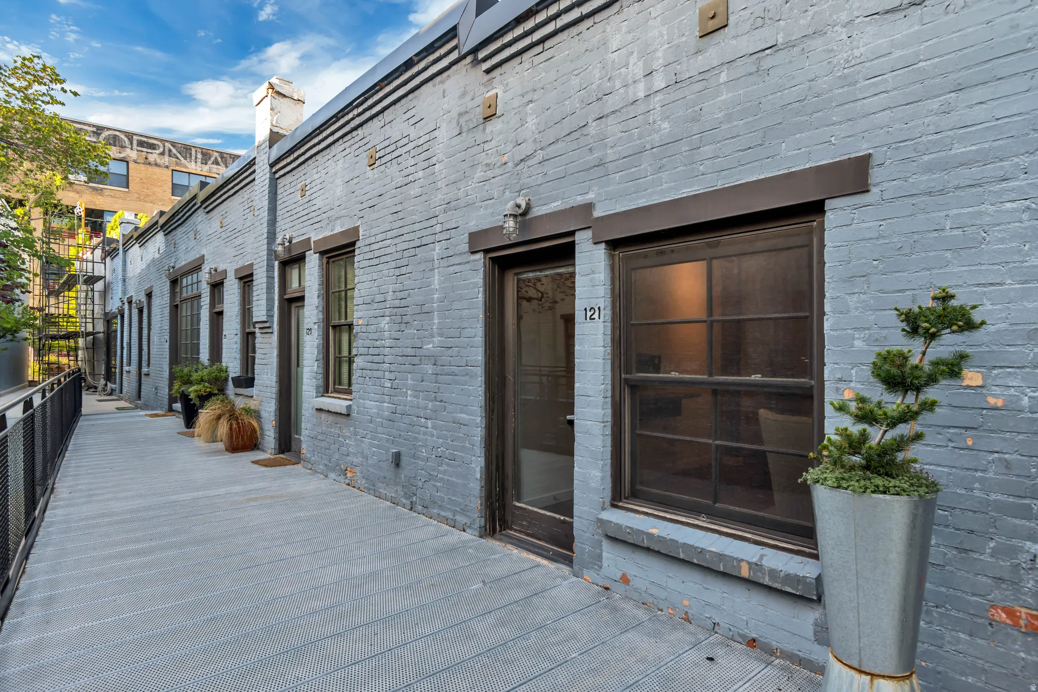 Doorway to property with brick siding