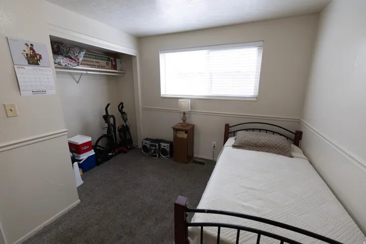 Bedroom featuring a closet, carpet
