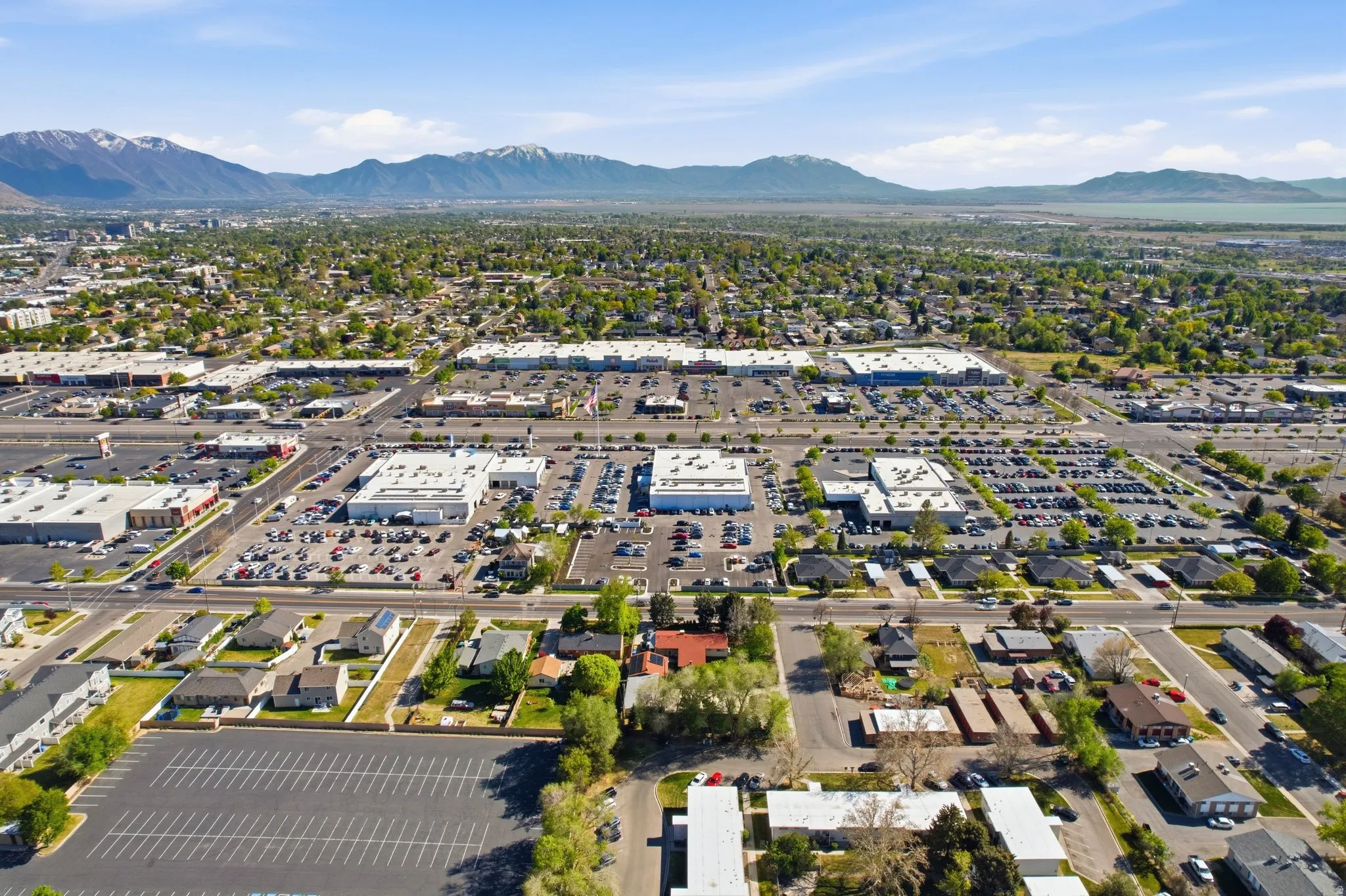 Aerial view of property and surrounding area with mountains