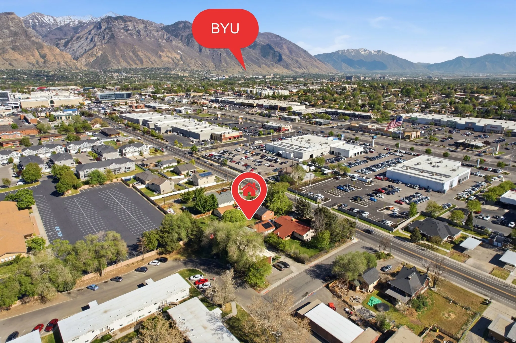 Aerial overview of property's location featuring mountains