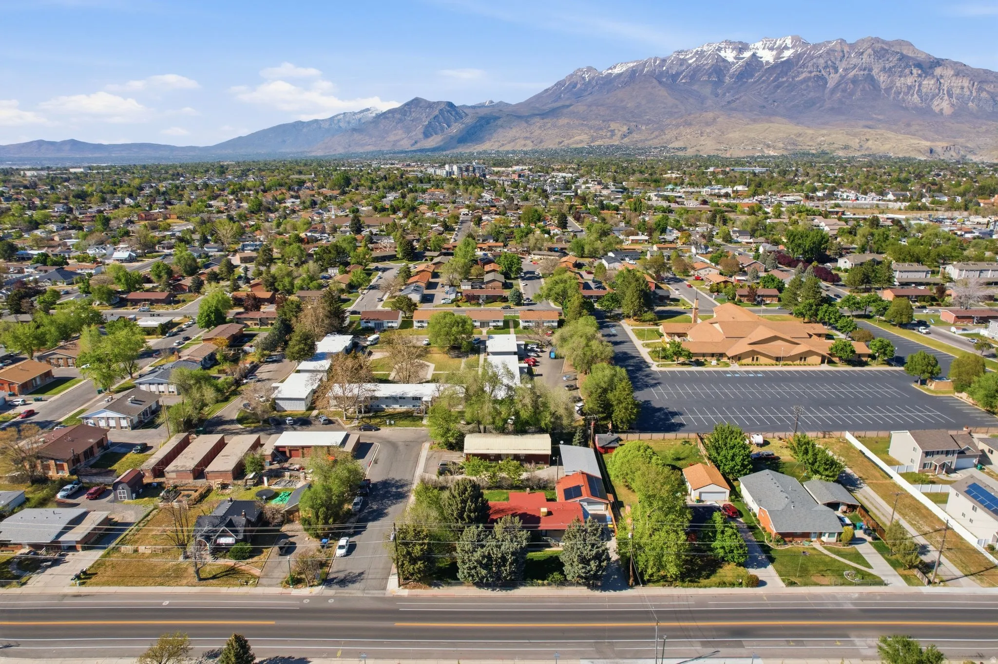 Aerial view of residential area with a mountainous background
