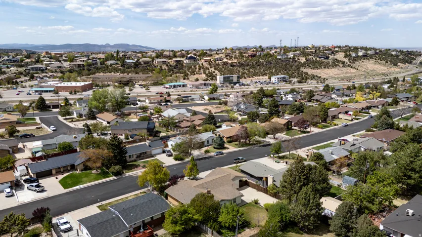 Aerial view of residential area with mountains