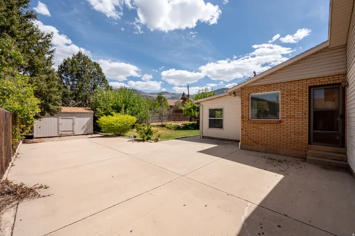View of patio / terrace with a storage shed
