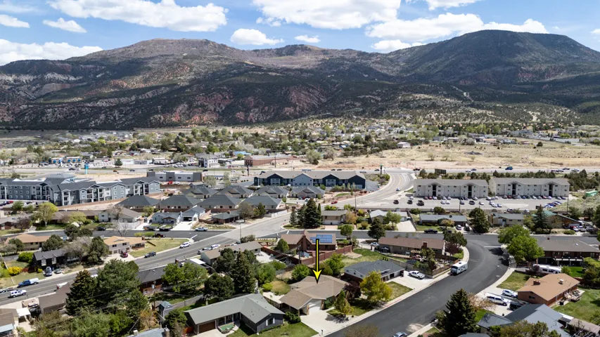 Aerial perspective of suburban area with mountains