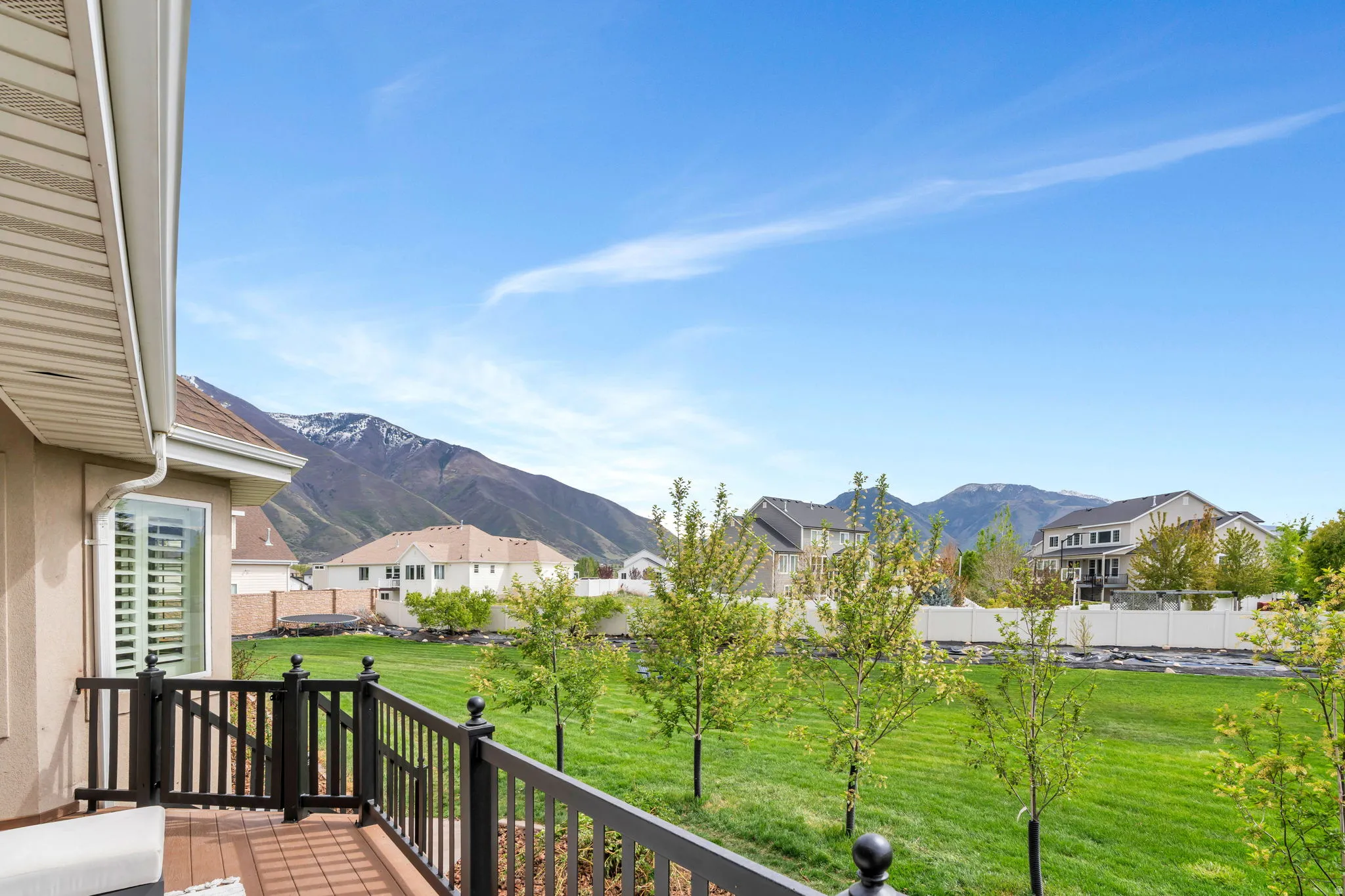 View of mountain backdrop with nearby suburban area
