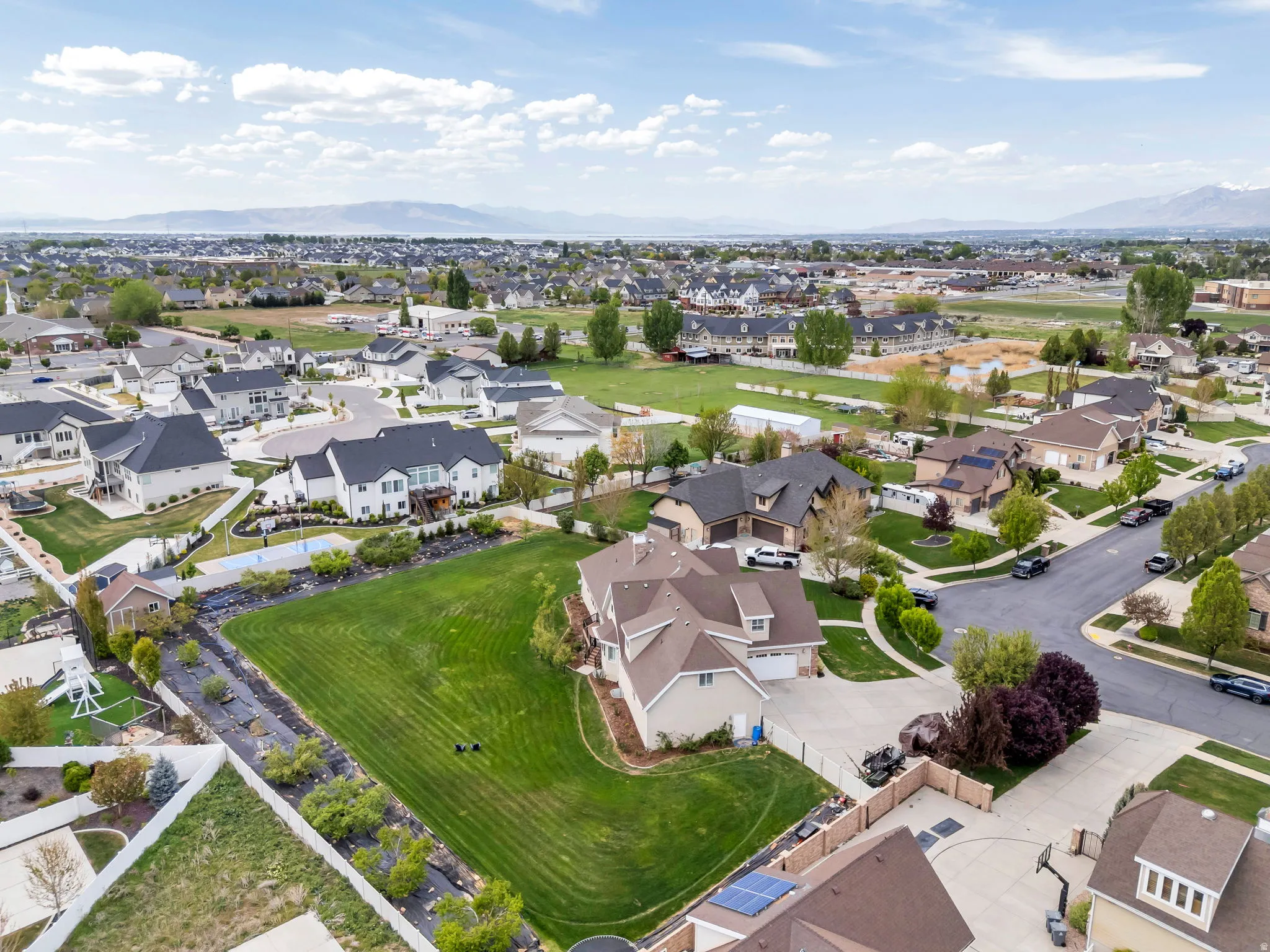 Aerial view of residential area featuring mountains