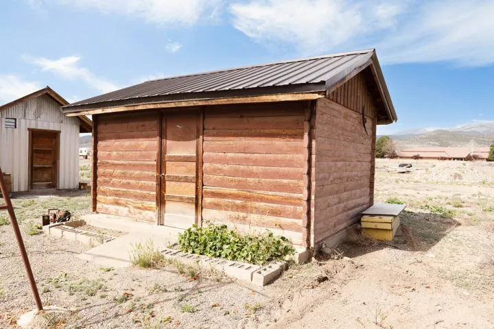 View of shed with a mountain view