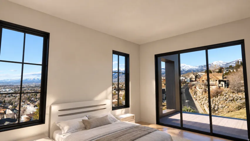 Spacious room featuring multiple large windows and a sliding glass door, providing abundant natural light