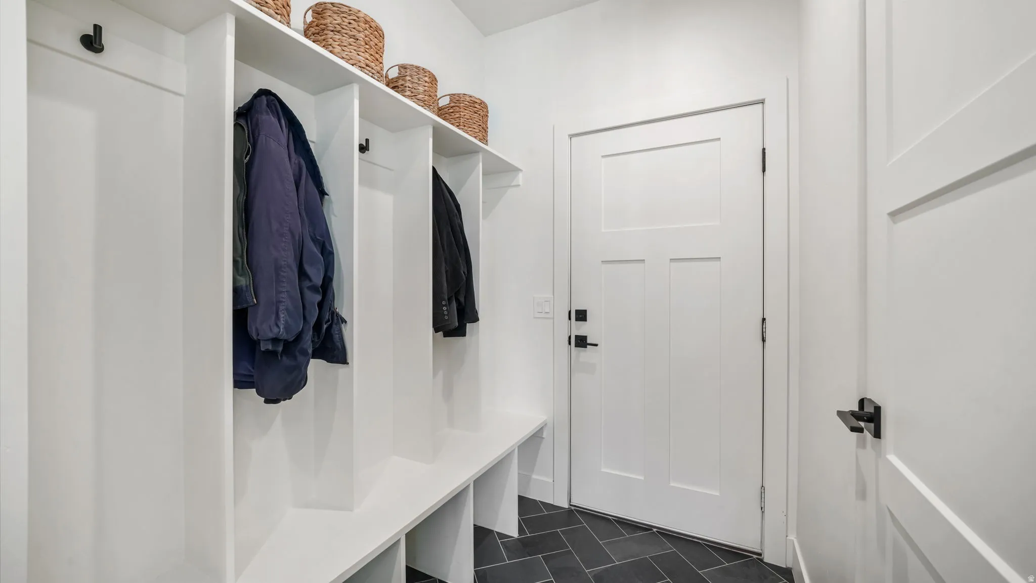 View of mudroom with garage access