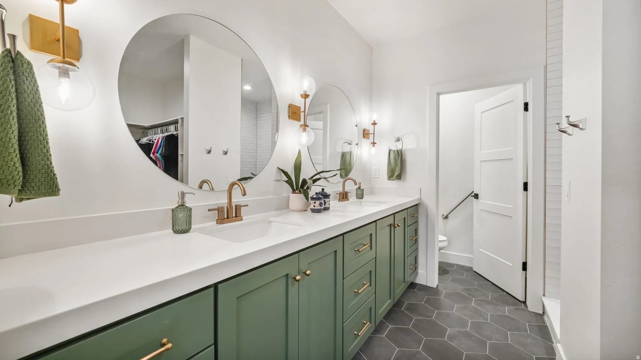 Primary bath with dual vanity, shower, closet and toilet room