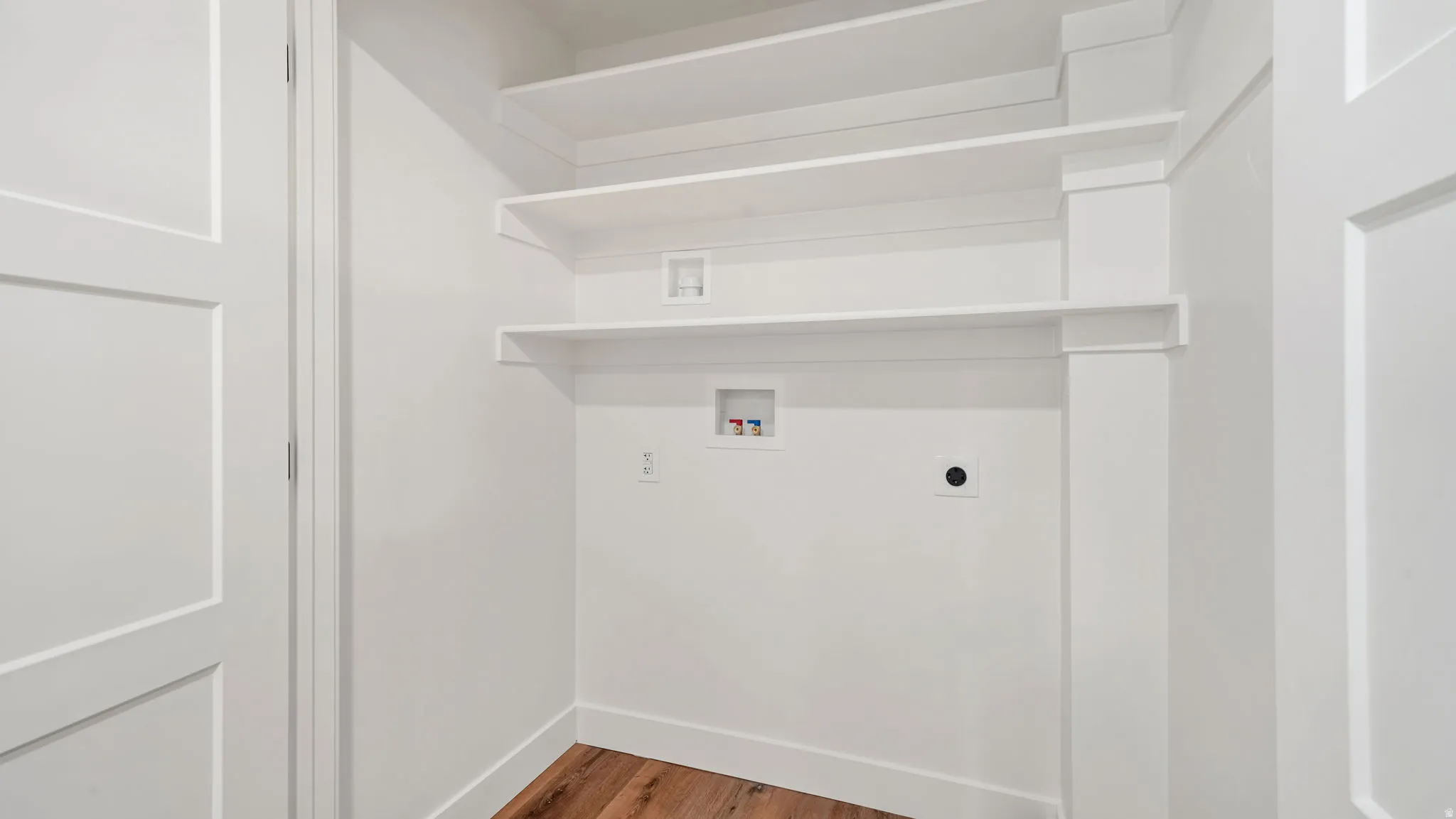 Laundry area in basement bedroom